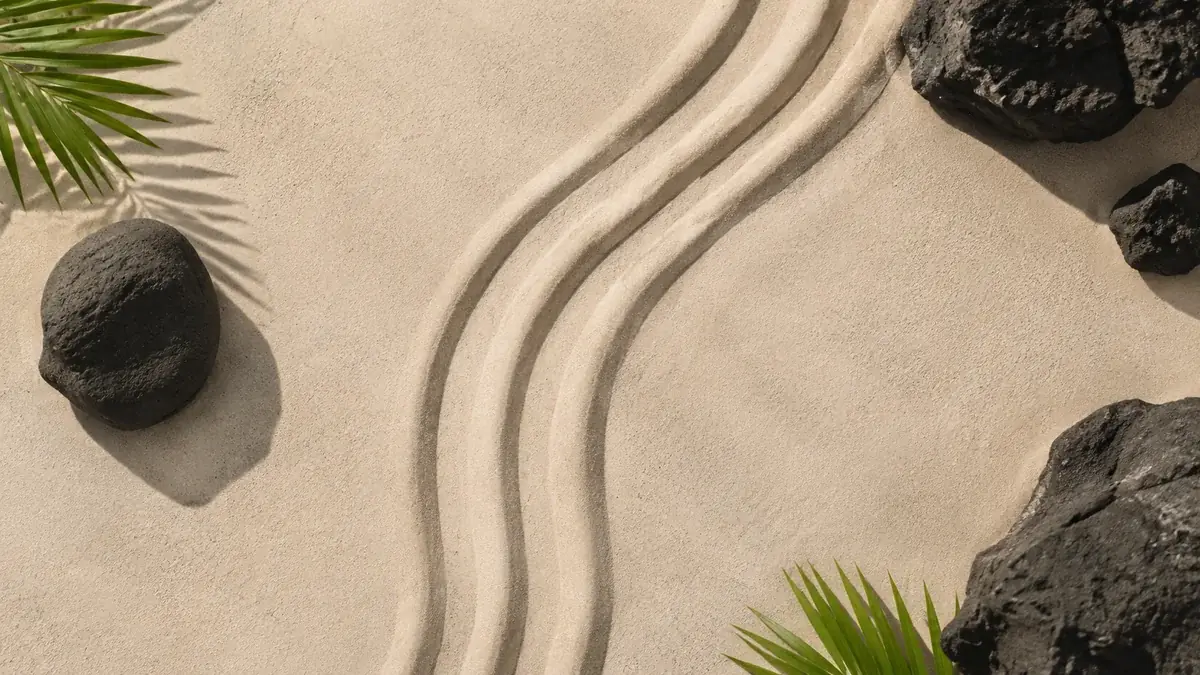 Choosing wireless: three gently curved parallel paths in sand viewed from above